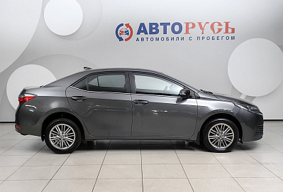 Corolla, XI (E160, E170, E180) Рестайлинг 1